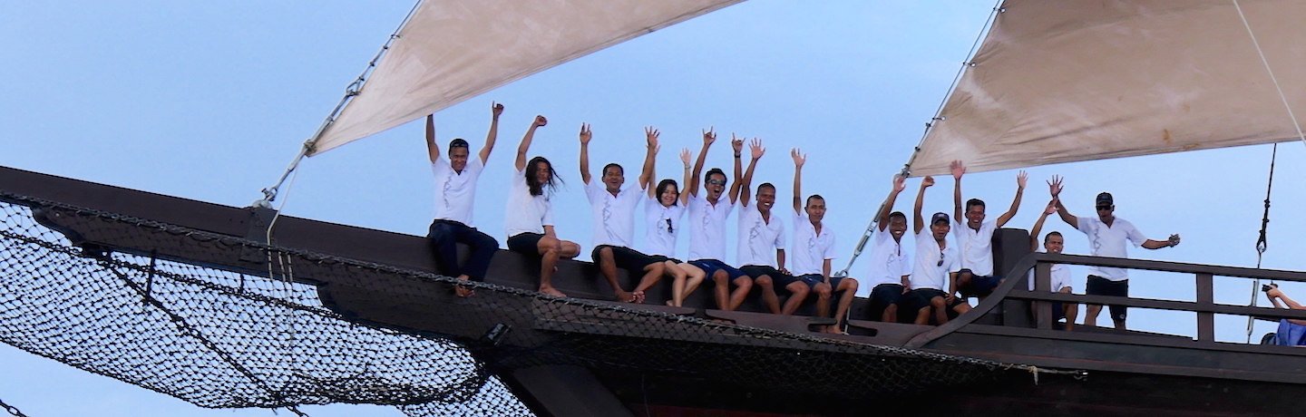 Phinisi Charter vessel and liveaboard WAOW's crew cruising, sailing and scuba diving in Indonesia Papua Barat Cenderawasih,  Lembeh Strait, Manado, Celebes Sea to Sangihe